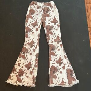 Cow print flares-buckle brand saints & heart. Size Xs. Fit like a 7/8.